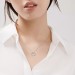Tiffany T Diamond Pendant in White Gold with a Baguette Diamond